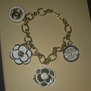 CHANEL One Of A Kind Gold Black and White Charm Bracelet Stamped Charms